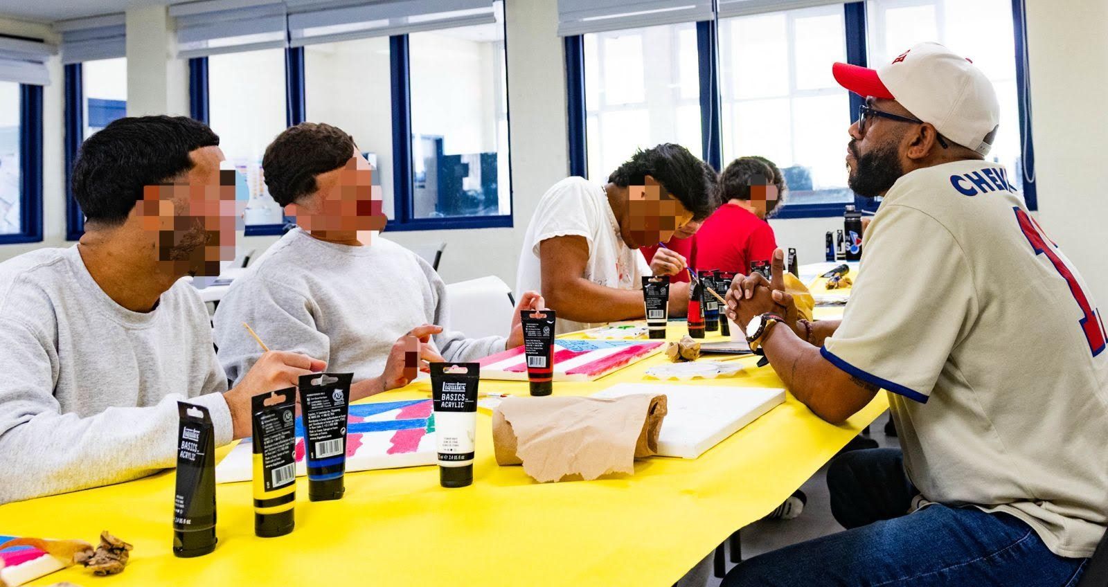 Youth participating in Reflections of Dignity art workshop